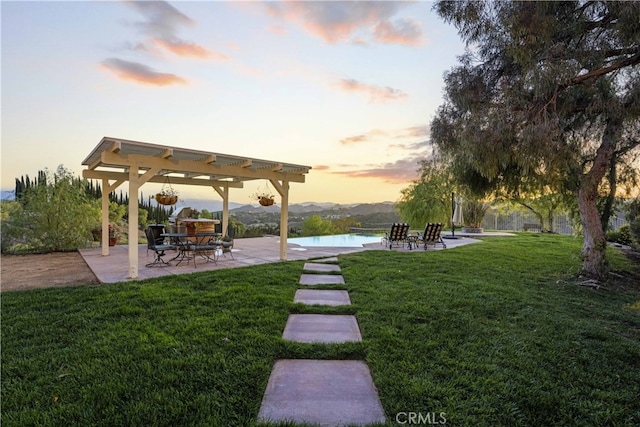view of home's community featuring a yard, a pool, a patio, and a pergola