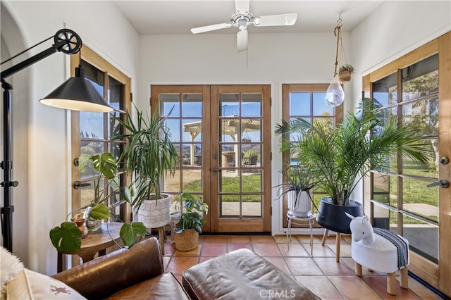 sunroom featuring french doors and plenty of natural light