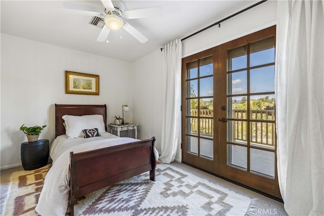 bedroom with french doors, carpet flooring, and a ceiling fan