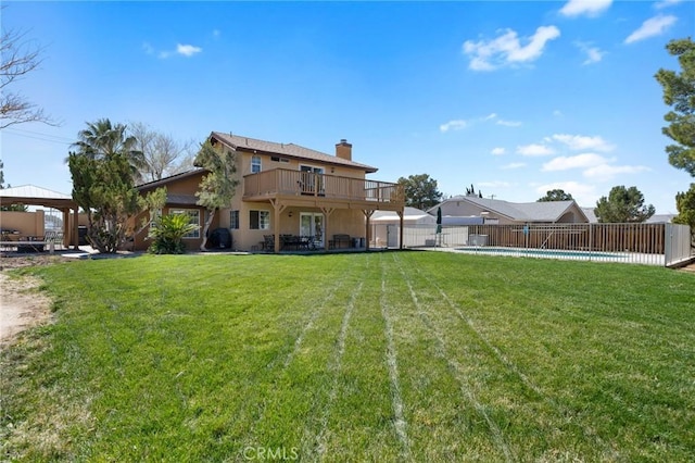 view of yard featuring a gazebo, a fenced in pool, and fence