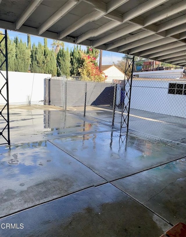 view of patio / terrace featuring fence