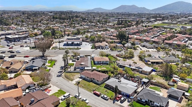 bird's eye view featuring a mountain view and a residential view