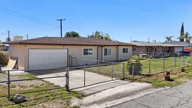 ranch-style house featuring a gate, driveway, a fenced front yard, and stucco siding