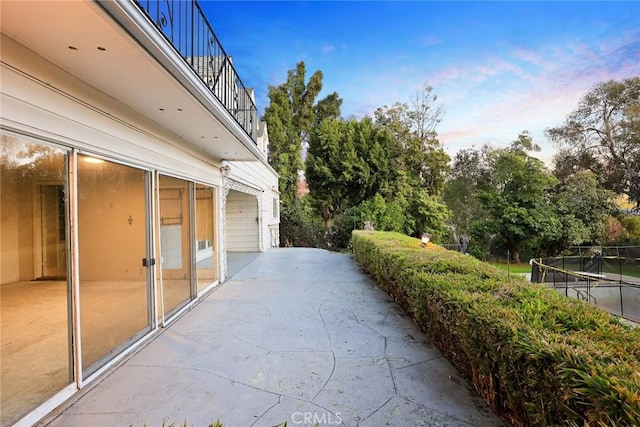 view of patio with a balcony