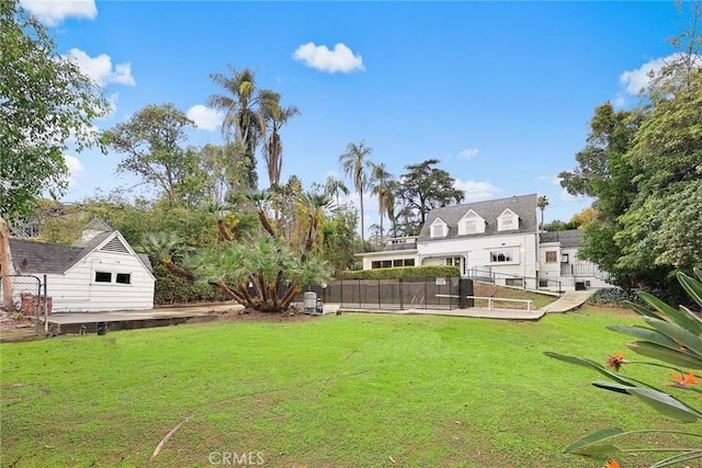 view of yard with fence