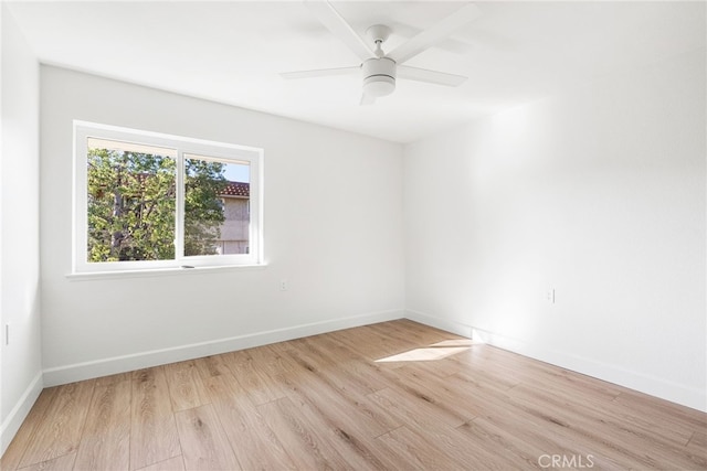 2392 Via Mariposa W Unit 3D, Laguna Woods, CA 92637 - unfurnished room with wood finished floors and baseboards
