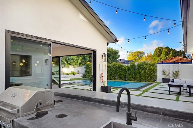 4949 Petit Ave, Encino, CA 91436 - view of patio with a fenced in pool and a sink