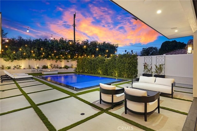 4949 Petit Ave, Encino, CA 91436 - view of swimming pool featuring an outdoor living space, a fenced in pool, a fenced backyard, and a patio area