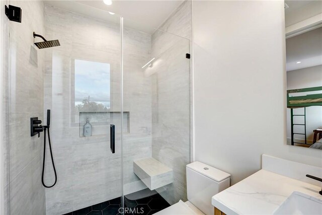 4949 Petit Ave, Encino, CA 91436 - bathroom with a stall shower, toilet, and vanity