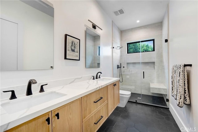 4949 Petit Ave, Encino, CA 91436 - full bathroom with a shower stall, toilet, visible vents, and a sink