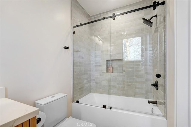 4949 Petit Ave, Encino, CA 91436 - bathroom featuring vanity, toilet, and bath / shower combo with glass door