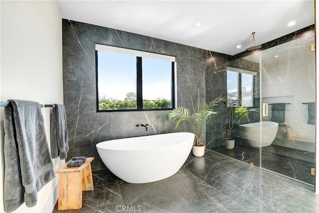 4949 Petit Ave, Encino, CA 91436 - bathroom featuring recessed lighting, marble finish floor, a freestanding bath, and walk in shower