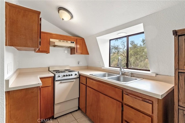 13155 San Antonio Rd, Atascadero, CA 93422 - kitchen featuring white electric stove, under cabinet range hood, a sink, vaulted ceiling, and light countertops