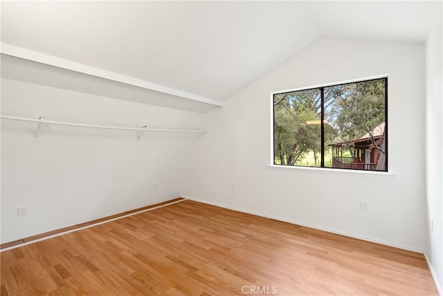 13155 San Antonio Rd, Atascadero, CA 93422 - unfurnished bedroom with light wood-type flooring, lofted ceiling, and baseboards