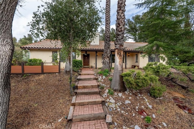 13155 San Antonio Rd, Atascadero, CA 93422 - view of front of property featuring stucco siding, a tiled roof, and fence