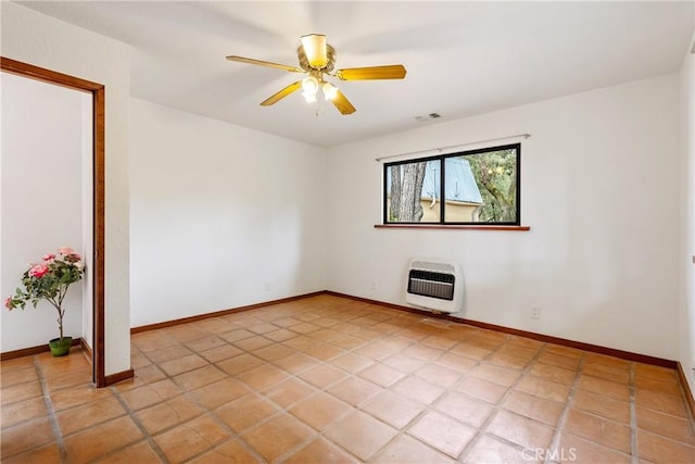 13155 San Antonio Rd, Atascadero, CA 93422 - spare room with heating unit, a ceiling fan, baseboards, and light tile patterned flooring