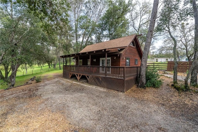 13155 San Antonio Rd, Atascadero, CA 93422 - chalet / cabin featuring a wooden deck, fence, and a shingled roof