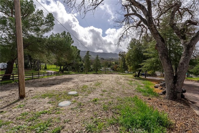 13155 San Antonio Rd, Atascadero, CA 93422 - view of yard with a mountain view and fence