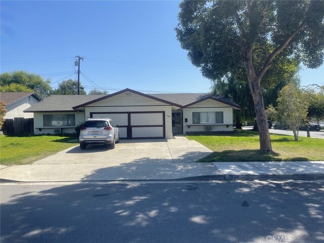 1924 Royalty Dr, Pomona, CA 91767 - single story home featuring a front lawn, an attached garage, and concrete driveway