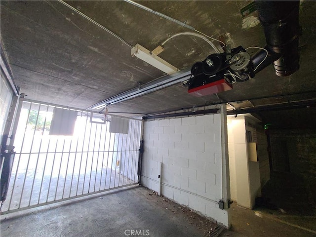 garage featuring concrete block wall