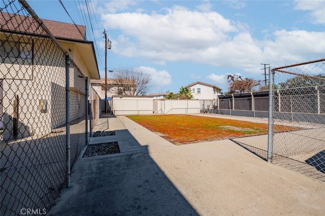 1935 Royalty Dr, Pomona, CA 91767 - view of yard featuring a fenced backyard and a patio