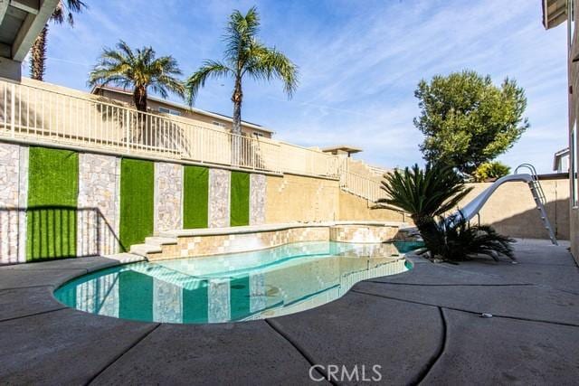 pool featuring fence