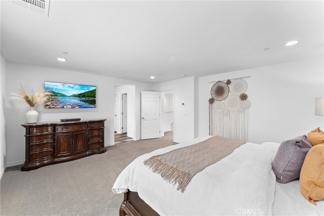 carpeted bedroom with baseboards, visible vents, and recessed lighting