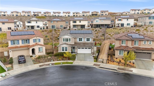 11636 Wandering Way, Corona, CA 92883 - townhome / multi-family property with a residential view, concrete driveway, and solar panels