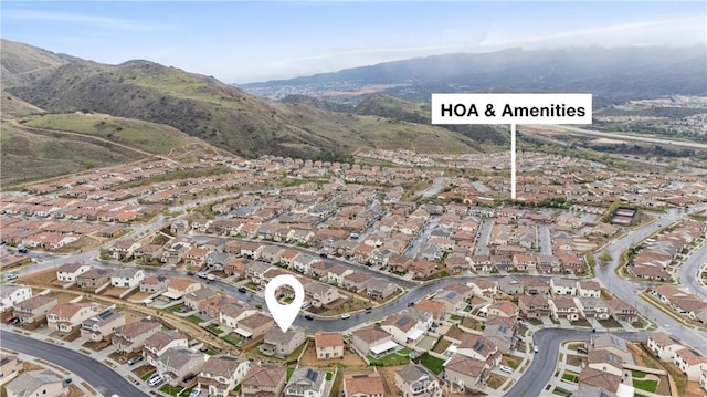11636 Wandering Way, Corona, CA 92883 - aerial overview of property's location with nearby suburban area and a mountain backdrop