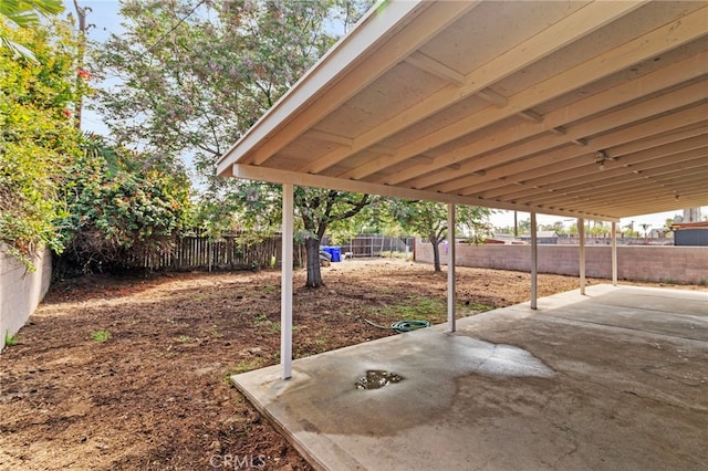 view of yard featuring a patio area and a fenced backyard