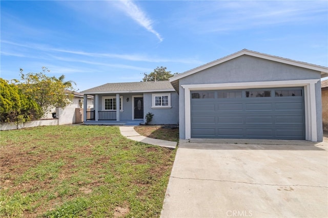 single story home with a front lawn, a garage, driveway, and stucco siding