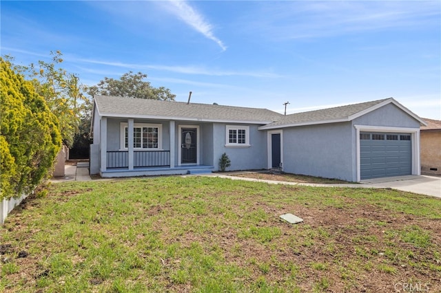 ranch-style house with an attached garage, driveway, and stucco siding