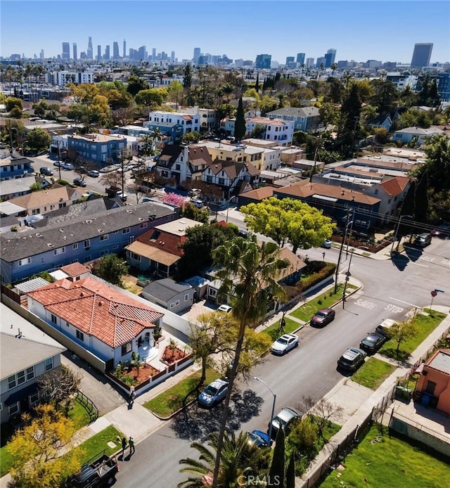 birds eye view of property with a city view
