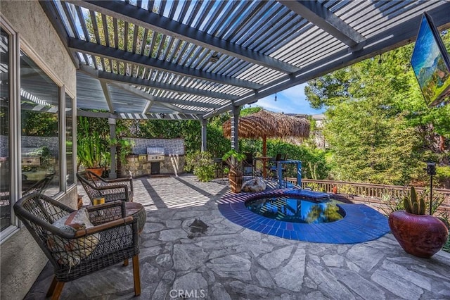view of patio featuring area for grilling, a jacuzzi, and a pergola