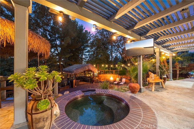 view of pool featuring a patio area, a gazebo, an in ground hot tub, and a pergola