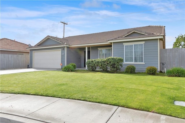 single story home with fence, a front lawn, concrete driveway, and an attached garage