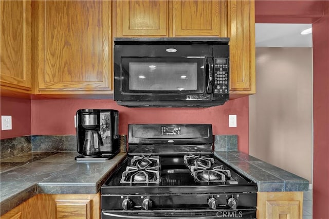 kitchen with black appliances