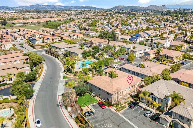 birds eye view of property with a residential view and a mountain view