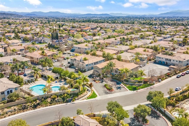 bird's eye view featuring a residential view and a mountain view