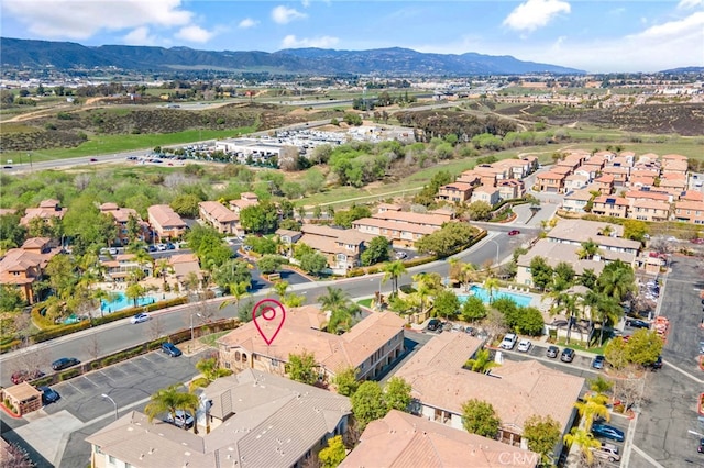 bird's eye view featuring a residential view and a mountain view