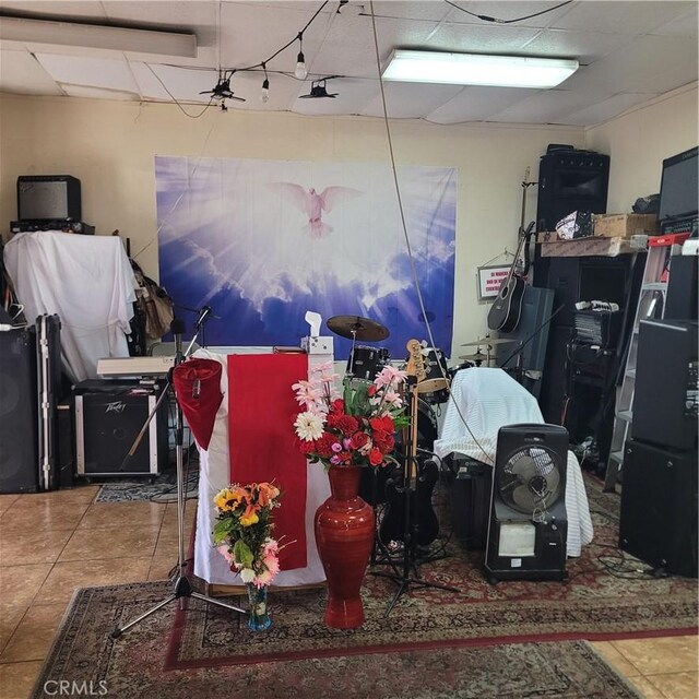 125 W Vernon Ave, Los Angeles, CA 90037 - miscellaneous room featuring a drop ceiling and tile patterned flooring