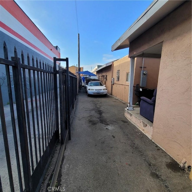 125 W Vernon Ave, Los Angeles, CA 90037 - view of car parking with fence