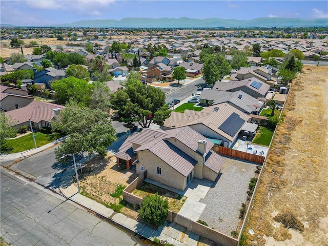birds eye view of property featuring a residential view and a mountain view