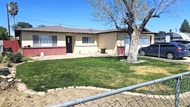 3816 Phaffle Dr, Bakersfield, CA 93309 - ranch-style house featuring stucco siding, a garage, and brick siding