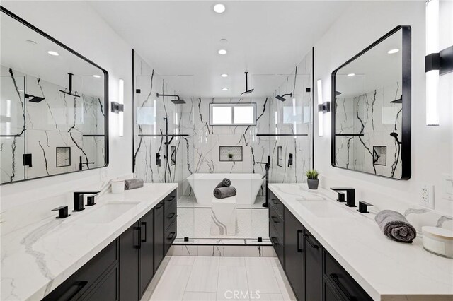 201 S Juanita Ave, Redondo Beach, CA 90277 - bathroom with a marble finish shower, a soaking tub, two vanities, and recessed lighting