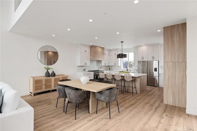 201 S Juanita Ave, Redondo Beach, CA 90277 - dining area with recessed lighting and light wood finished floors