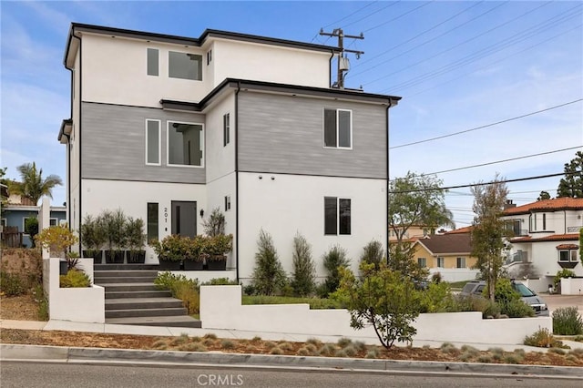 201 S Juanita Ave, Redondo Beach, CA 90277 - rear view of house featuring stucco siding