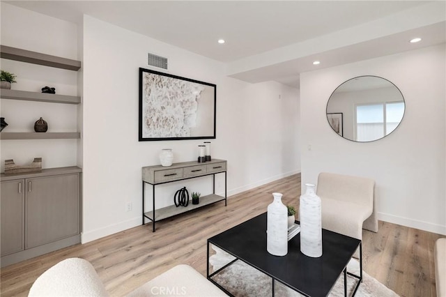 201 S Juanita Ave, Redondo Beach, CA 90277 - living room with recessed lighting, light wood finished floors, and built in features