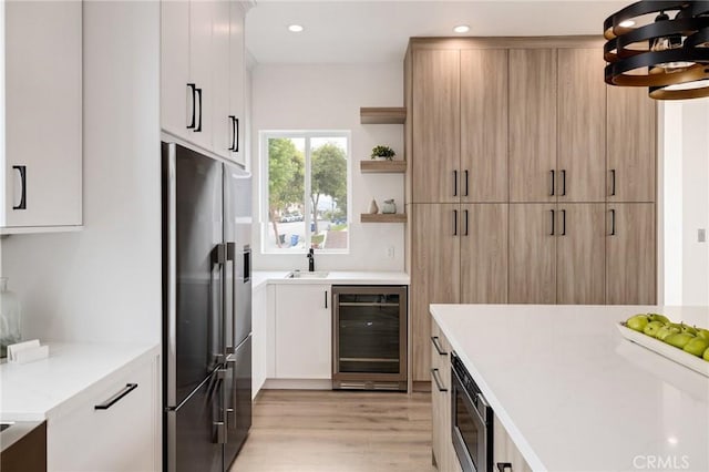 201 S Juanita Ave, Redondo Beach, CA 90277 - kitchen with stainless steel appliances, beverage cooler, light wood finished floors, open shelves, and light brown cabinets