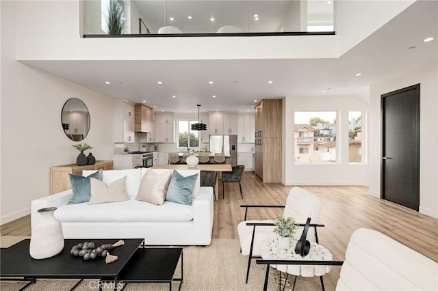 201 S Juanita Ave, Redondo Beach, CA 90277 - living room with light wood-type flooring and recessed lighting